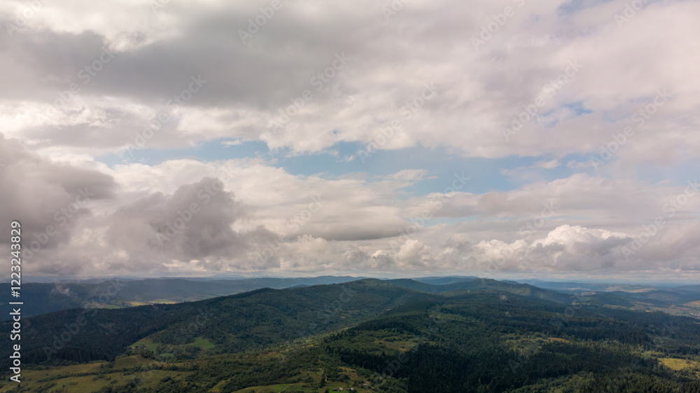 Magnificent Aerial View Of Mountains And Dense Forests Under Dark Clouds, With Raindrops Falling, Creating A Dramatic And Serene Atmosphere In A Remote Natural Landscape.
Magnificent Aerial View Of Mountains And Dense Forests Under Dark Clouds, With Raindrops Falling, Creating A Dramatic And Serene Atmosphere In A Remote Natural Landscape.