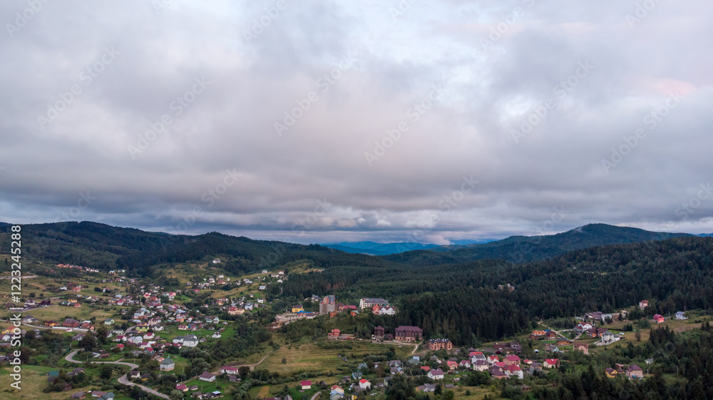 Aerial View Of A City Surrounded By Majestic Mountains Under A Cloudy Sky. The Dramatic Landscape Creates A Stunning Contrast Between Urban Life And Natural Beauty.
Aerial View Of A City Surrounded By Majestic Mountains Under A Cloudy Sky. The Dramatic Landscape Creates A Stunning Contrast Between Urban Life And Natural Beauty.