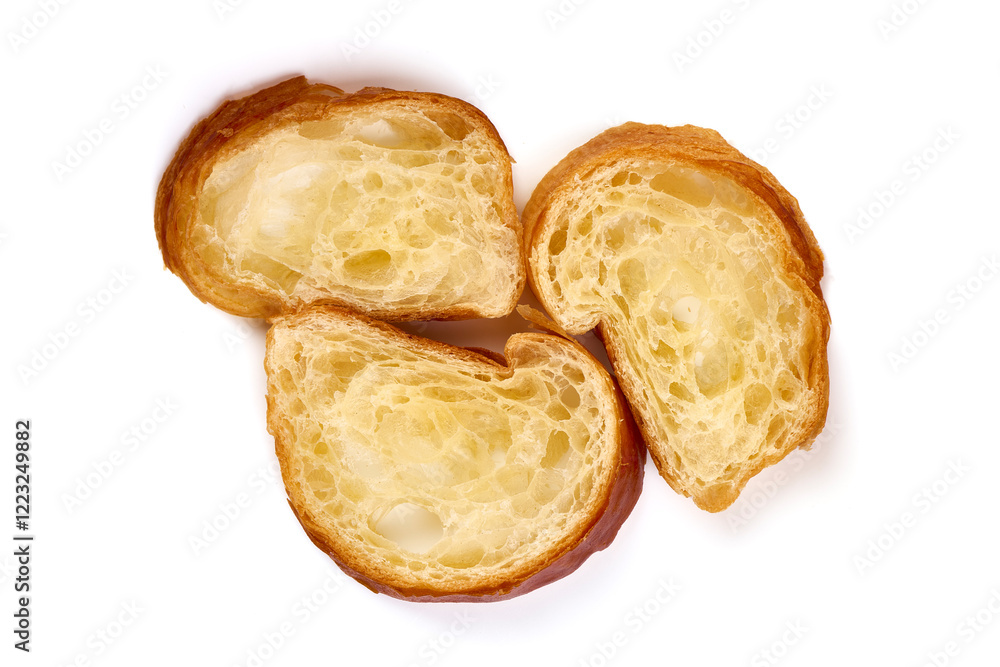 Freshly baked baguette slices, isolated on white background. Freshly baked baguette slices, isolated on white background.