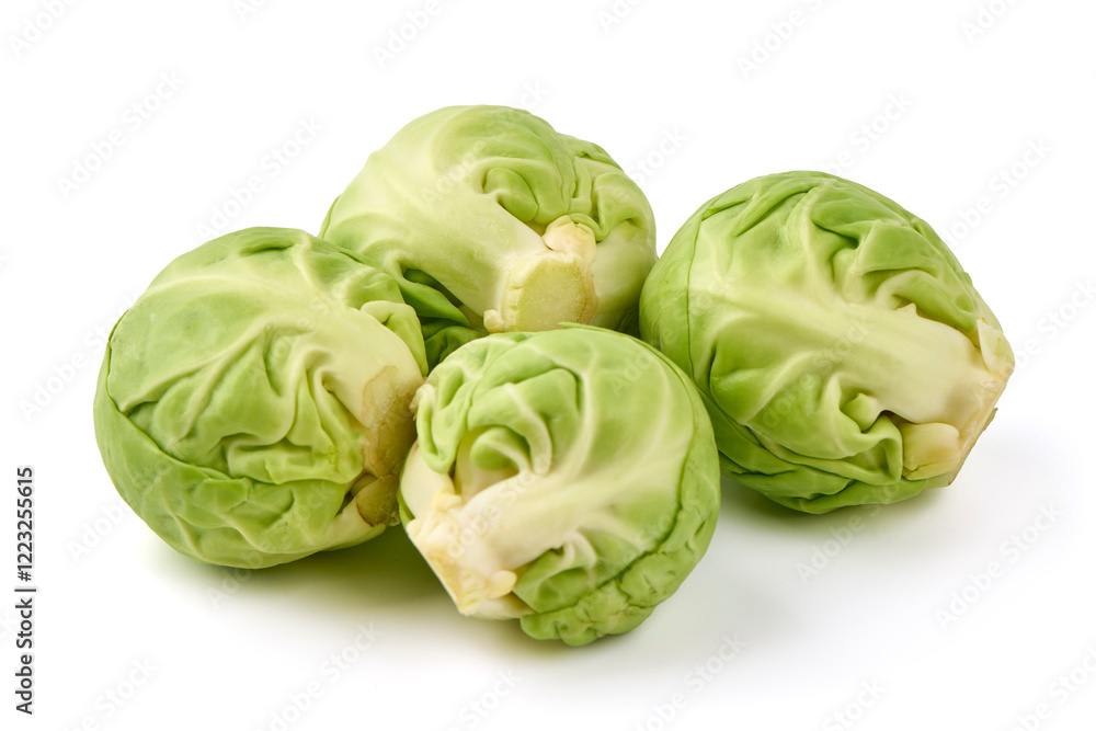 Obraz premium Fresh green Brussels sprouts, isolated on white background. High resolution image.