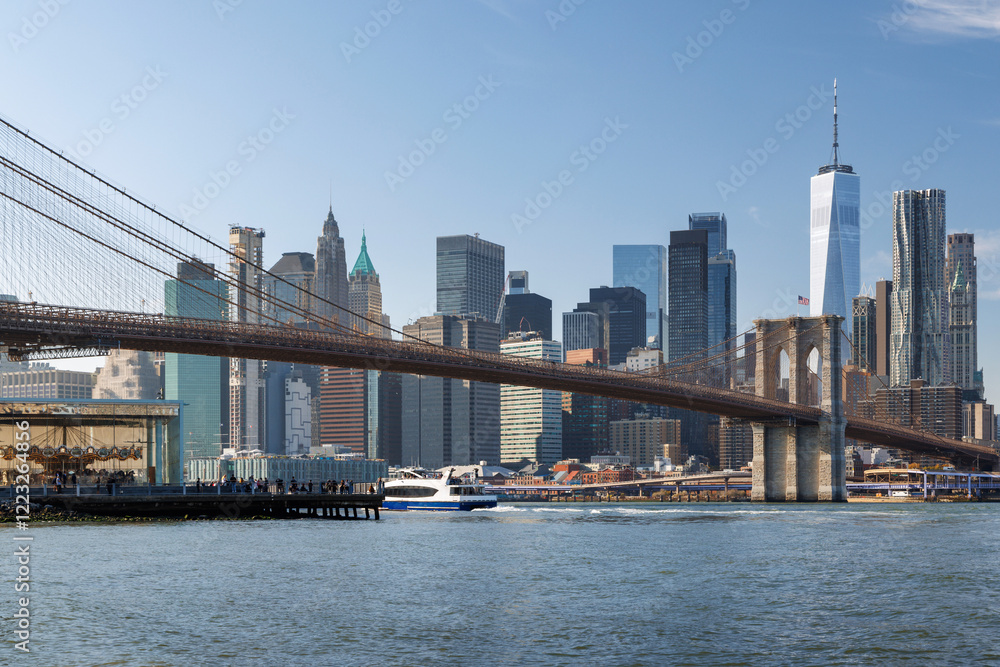 Iconic view of Brooklyn Bridge with Manhattan skyscrapers Iconic view of Brooklyn Bridge with Manhattan skyscrapers