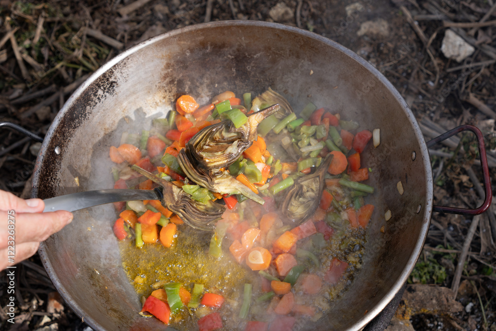 Artichokes, Carrots, and Peppers in a Paella Pan Artichokes, Carrots, and Peppers in a Paella Pan