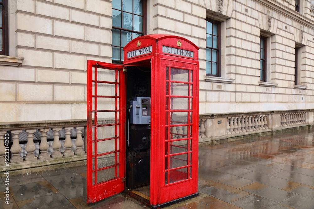 London UK red telephone in rainy weather London UK red telephone in rainy weather