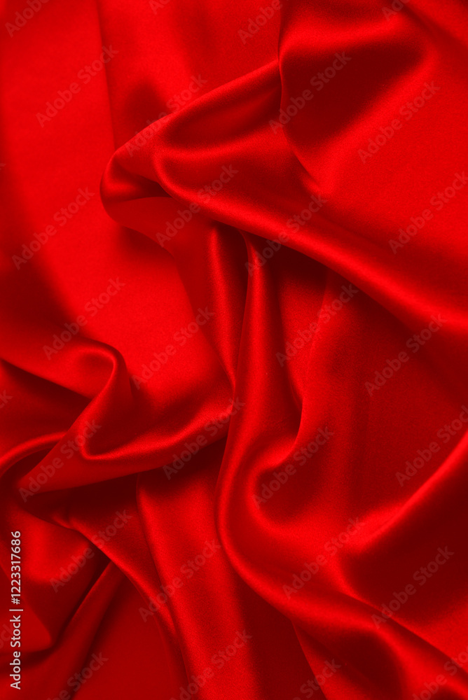 Red silk or satin luxury fabric texture can use as abstract background. Top view. Red silk or satin luxury fabric texture can use as abstract background. Top view.