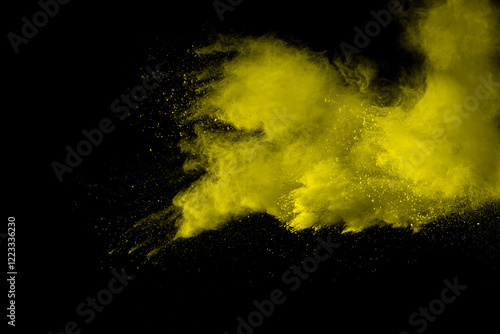 Yellow cloud of powdery dust is blowing in the air