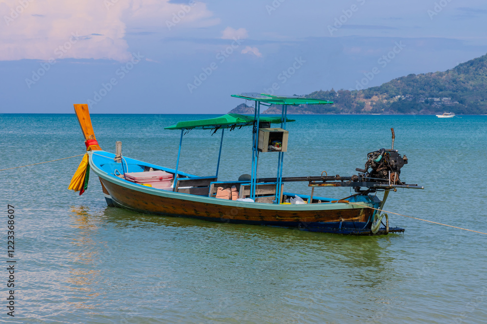 Patong Beach phuket Thailand beautiful turquoise blue waters on the white sand and long tail boats used for tourist Patong Beach phuket Thailand beautiful turquoise blue waters on the white sand and long tail boats used for tourist