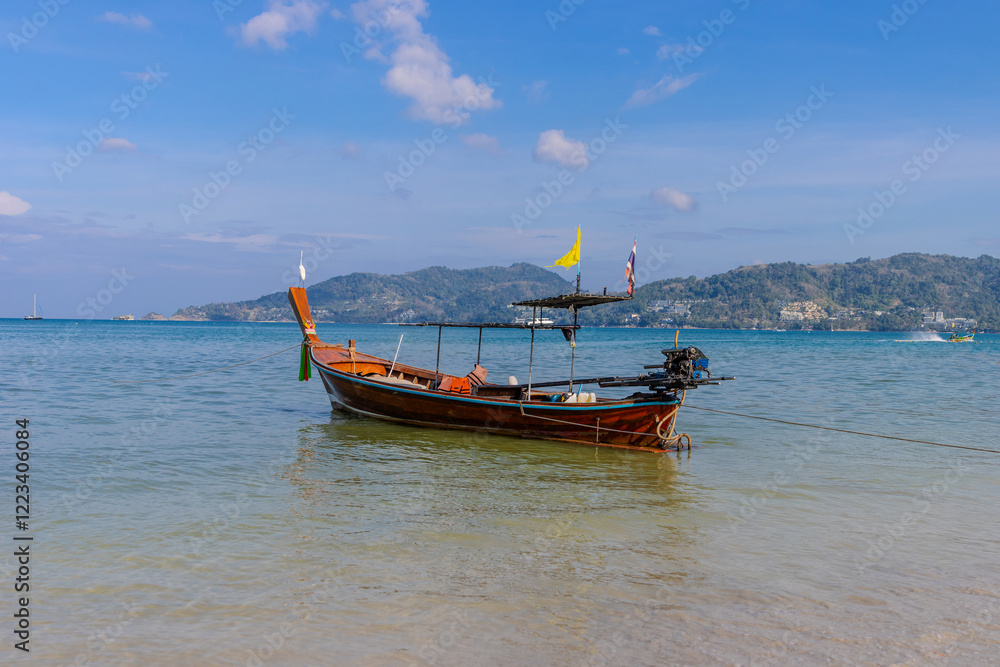 Patong Beach phuket Thailand beautiful turquoise blue waters on the white sand and long tail boats used for tourist Patong Beach phuket Thailand beautiful turquoise blue waters on the white sand and long tail boats used for tourist