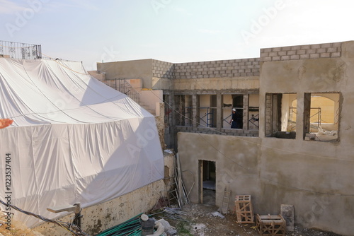 Fototapet Mosul, Mossul, Iraq - November 17 2024: rebuilding of the Al-Hadba, Al-Hadbaa mi