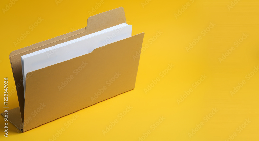Brown file folder with documents against yellow background Brown file folder with documents against yellow background
