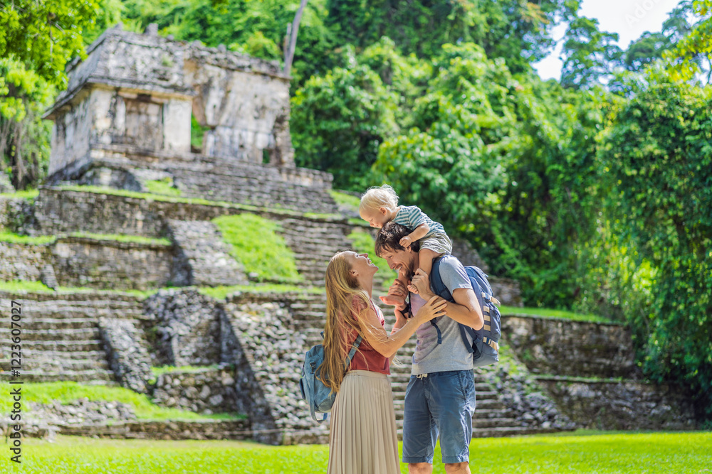 Mom, dad and baby son exploring the ancient pyramids of Palenque, Mexico, surrounded by dense jungle. Cultural heritage and adventure travel concept