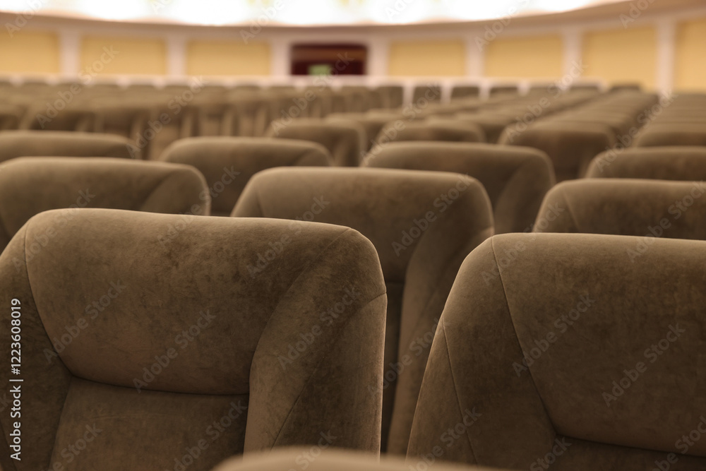 Obraz premium Rows of gray comfortable seats in theatre, closeup