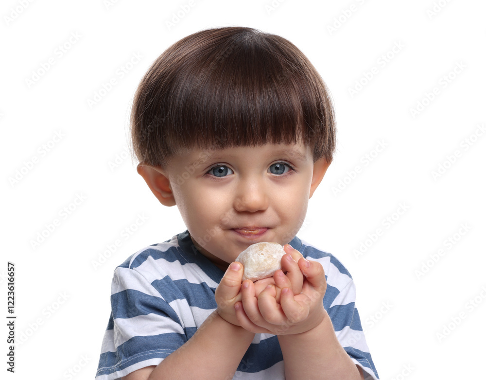 Naklejka premium Cute little child eating tasty mochi on white background