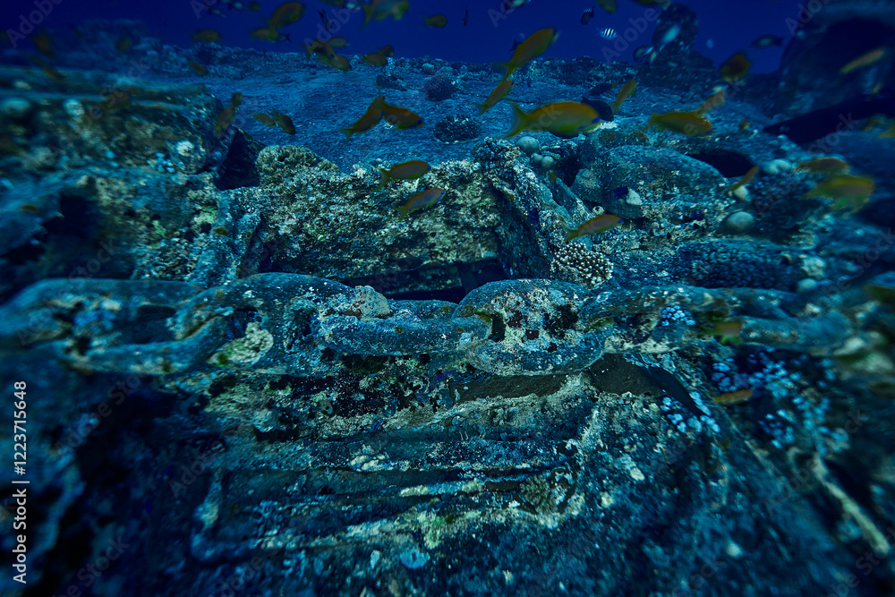 Mysterious underwater view on deck the ship wreck of SS Thistlegorm - British cargo steamship sunk by German bomber in the Red Sea, near Sharm El Sheikh, Egypt. Underwater photography and travel