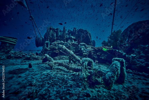 Obraz na płótnie Mysterious underwater view on deck the ship wreck of SS Thistlegorm - British cargo steamship sunk by German bomber in the Red Sea, near Sharm El Sheikh, Egypt. Underwater photography and travel w salonie