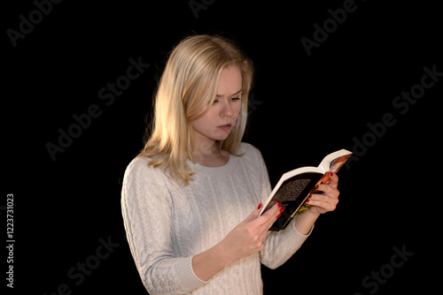 Surprised Woman Reading a Book in Deep Thought