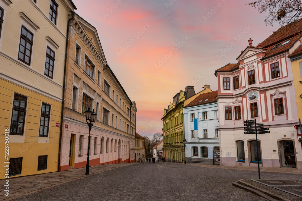 Narrow picturesque street with baroque and renaissance historical buildings. Cityscape of medieval town Pisek, Czechia.