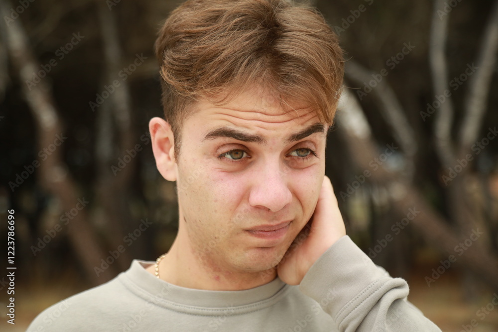 Boy With Curiosity Expression On Face Outdoors In Forest Boy With Curiosity Expression On Face Outdoors In Forest