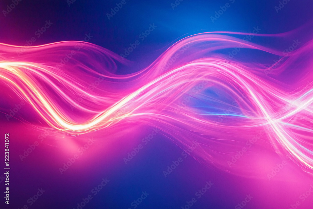Naklejka premium Vibrant abstract light trails in pink and blue hues creating a dynamic visual effect
