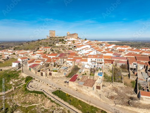 Aerial view of Nogales in Extremadura Spain, typical Spanish hilltop village with white washed houses, church and castle photo