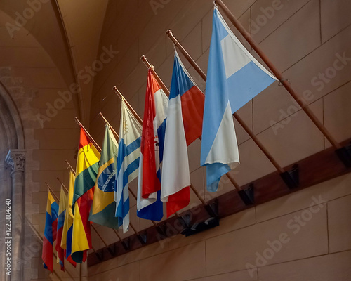 South American flags in a row one beside the other in their masts