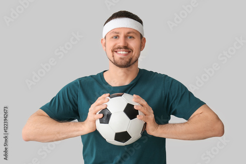 Happy man with soccer ball ...