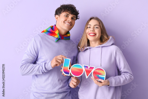 Young couple with word LOVE...