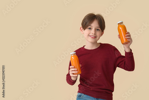 Little boy with bottles of ...