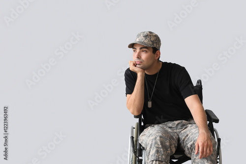 Young soldier in wheelchair...
