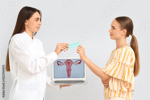 Female gynecologist giving ...