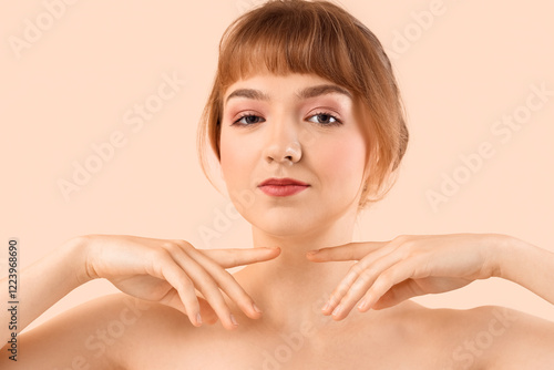 Beautiful young woman on be...