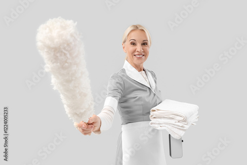 Middle-aged chambermaid wit...