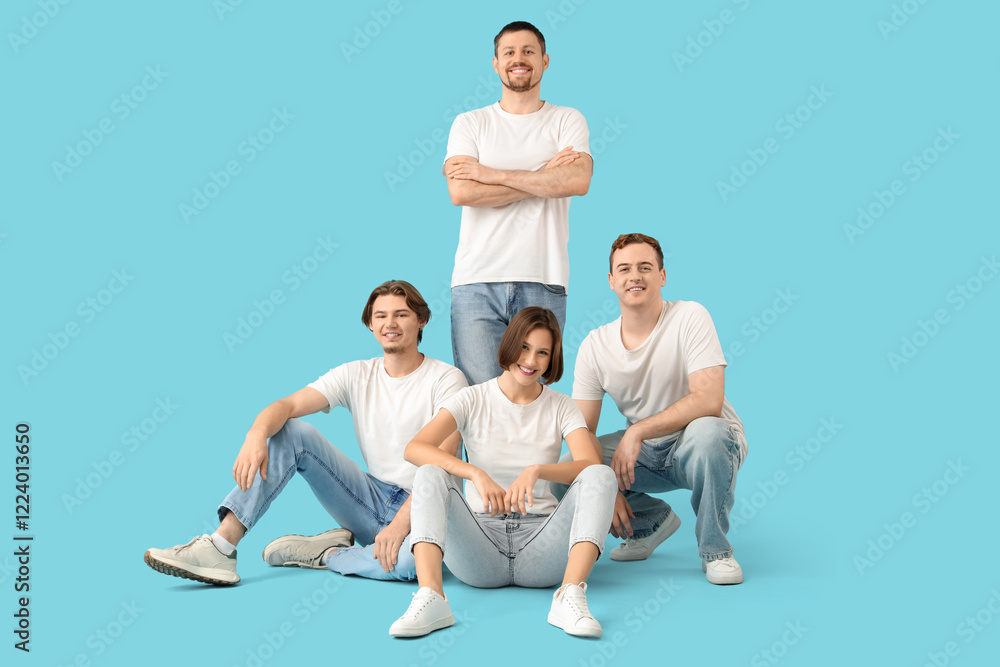 Group of young people in jeans on blue background Group of young people in jeans on blue background