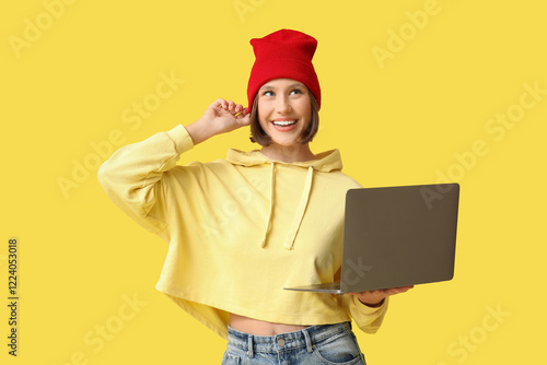 Smiling young woman in red ...