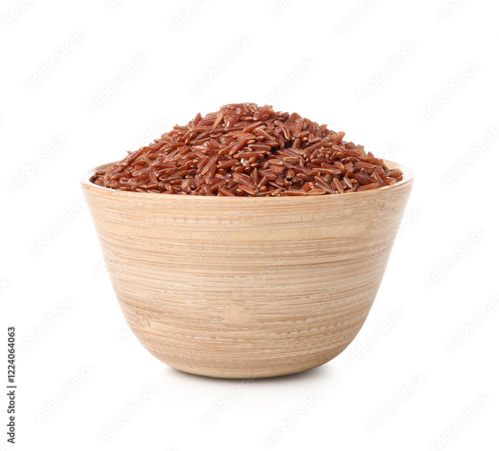Wooden bowl with raw brown rice on white background Wooden bowl with raw brown rice on white background