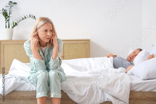 Irritated mature woman cove...