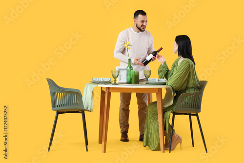 Young couple with wine at r...