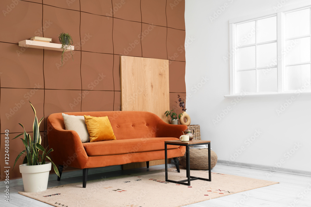 Obraz premium Interior of stylish living room with sofa, table and plants