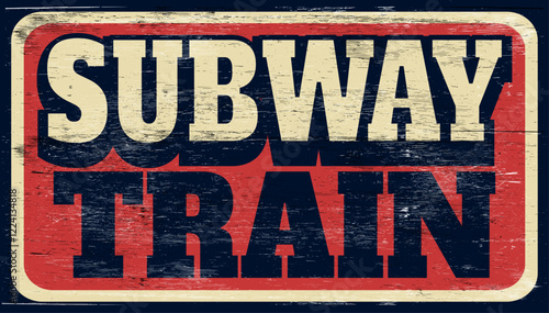 Aged and worn subway train sign on wood