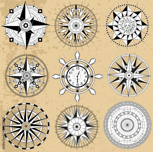 Design vector set with line art old compasses or rose winds with decorative elements, arrows and patterns. Vintage transportation and old adventures concept isolated on white.