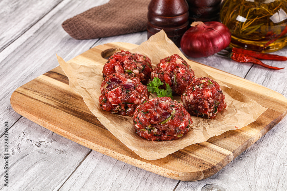 Raw beef meatballs for cooking Raw beef meatballs for cooking