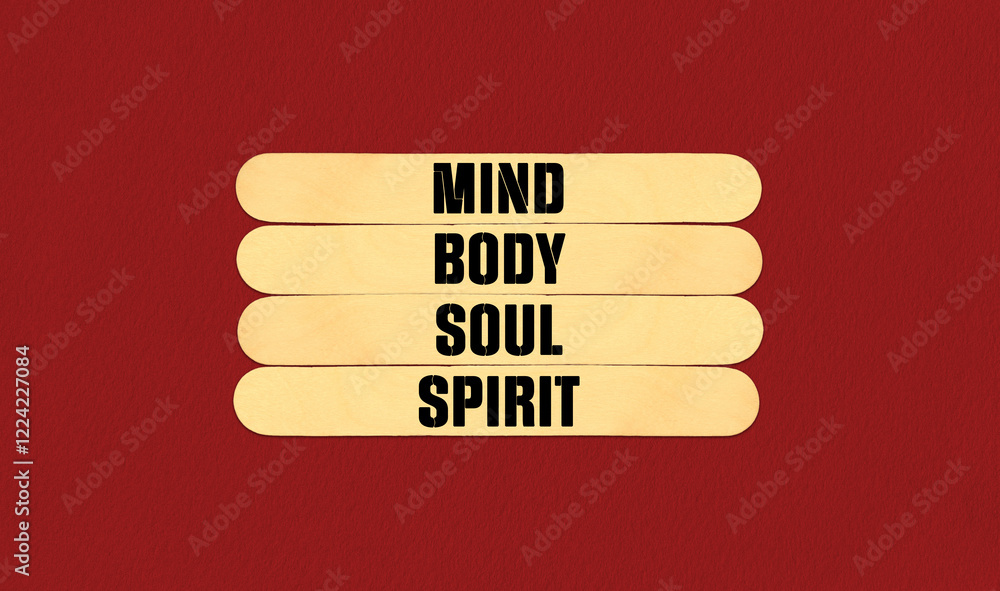Fototapeta premium Mind Body Soul Spirit Symbol. Concept word Mind Body Soul Spirit on beautiful wooden stick. Beautiful Red Chart Paper Background. Business and Mind Body Soul Spirit concept. Copy space