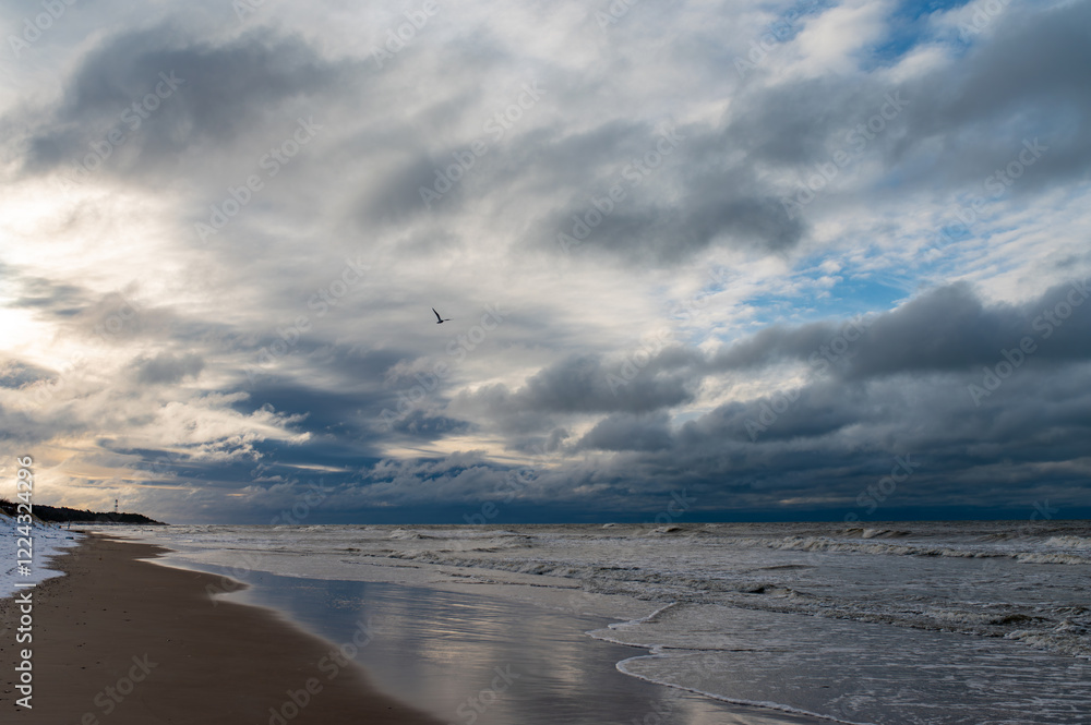 waves breaking on rocks after sunset close Palanga, Lithuania waves breaking on rocks after sunset close Palanga, Lithuania