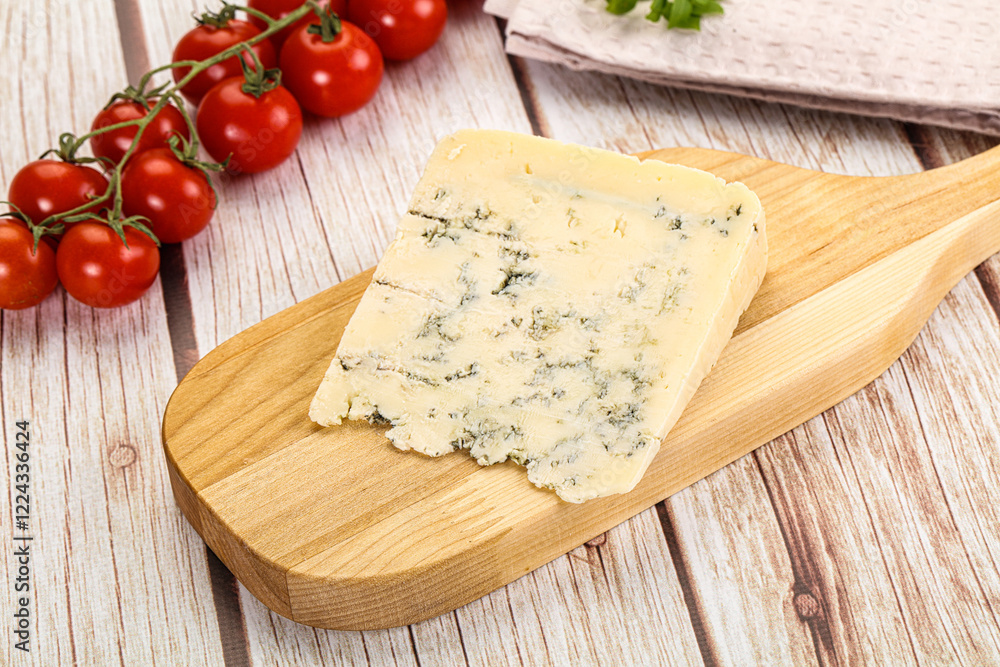 Blue cheese with mold over board Blue cheese with mold over board
