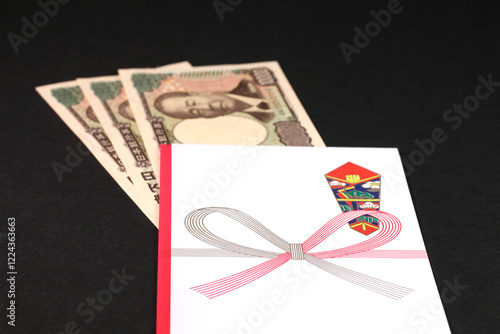 祝儀袋と一万円札