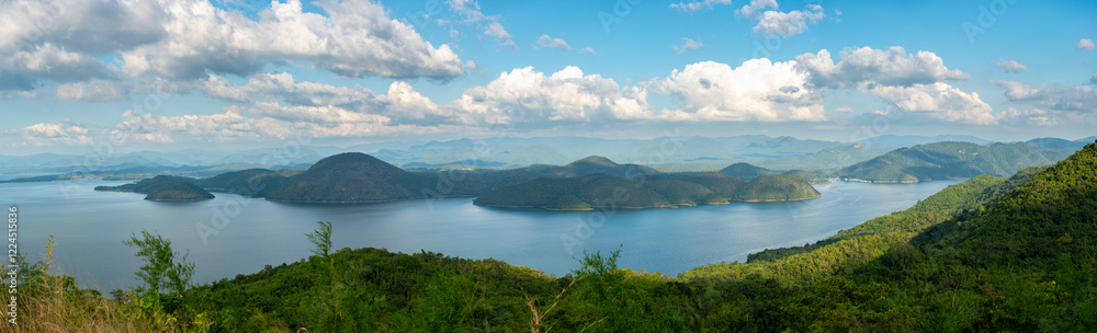 Panoramic morning view of Srinakarin Dam Reservoir, surrounded by tranquil beauty and intricate mountain ranges Panoramic morning view of Srinakarin Dam Reservoir, surrounded by tranquil beauty and intricate mountain ranges