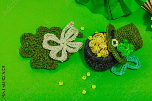 Handmade St. Patrick's Day concept. Traditional decorative symbols, pot with golden coins photo