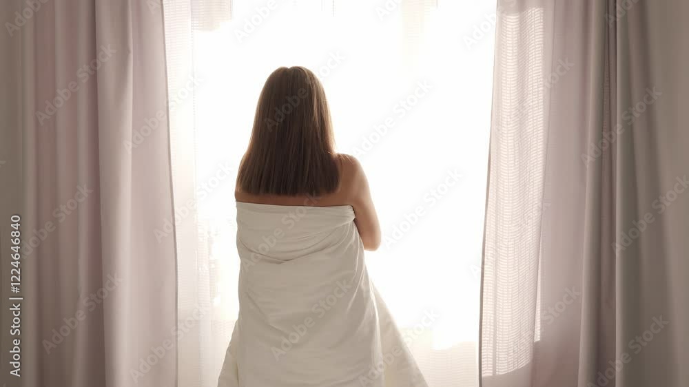 Woman wrapped in blanket enjoys soft morning sunlight near window embracing tranquility and warmth Cozy blanket enhances serene atmosphere highlighting peaceful moments of morning with blanket comfort Woman wrapped in blanket enjoys soft morning sunlight near window embracing tranquility and warmth Cozy blanket enhances serene atmosphere highlighting peaceful moments of morning with blanket comfort
