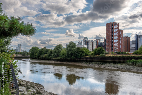 Caxton Works, East London, merges industrial heritage with modern architecture. This mixed-use development features contemporary apartments, creative studios, and local businesses, fostering a dynami