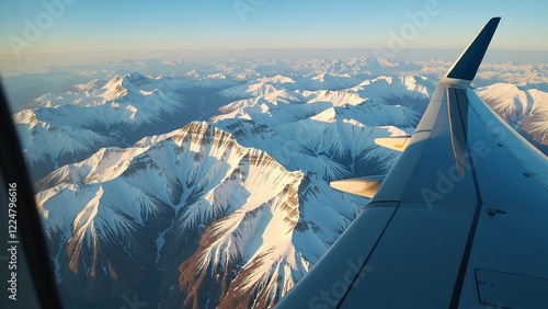 Aerial View of Snow-Capped Mountain Range from Airplane Wing, Winter Travel Photography PC, Laptop Wallpaper