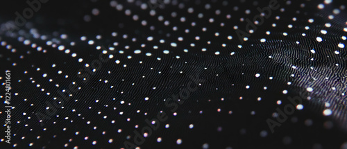 Exploring sharp dot texture on a crisp black background with defined patterns photo